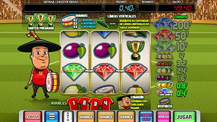 Game to the Manolo el del bombo slot where we can see the main character on the left with his characteristic beret and his bombo, information about the bonuses at the top, the game buttons at the bottom, information about the prizes on the right, the three reels in the center with some of their main symbols. The background is a football stadium.